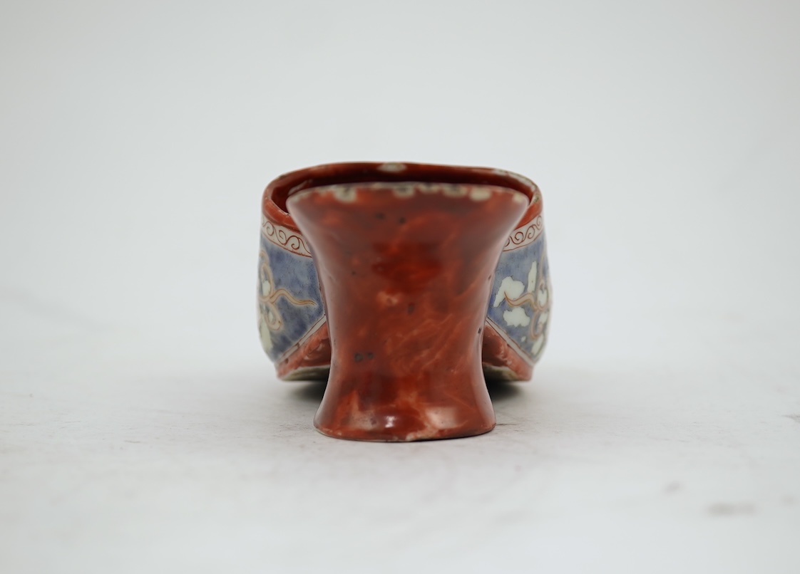 A rare Japanese Arita or Chinese porcelain model of a shoe, based on a Delft shape, first half of 18th century